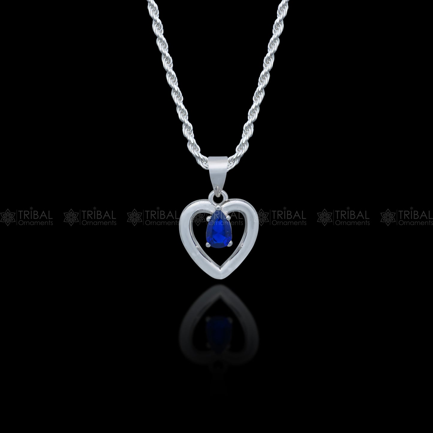 925 Sterling silver pendant set with blue sapphire diamond and heart-shaped design by Tribal Ornaments.