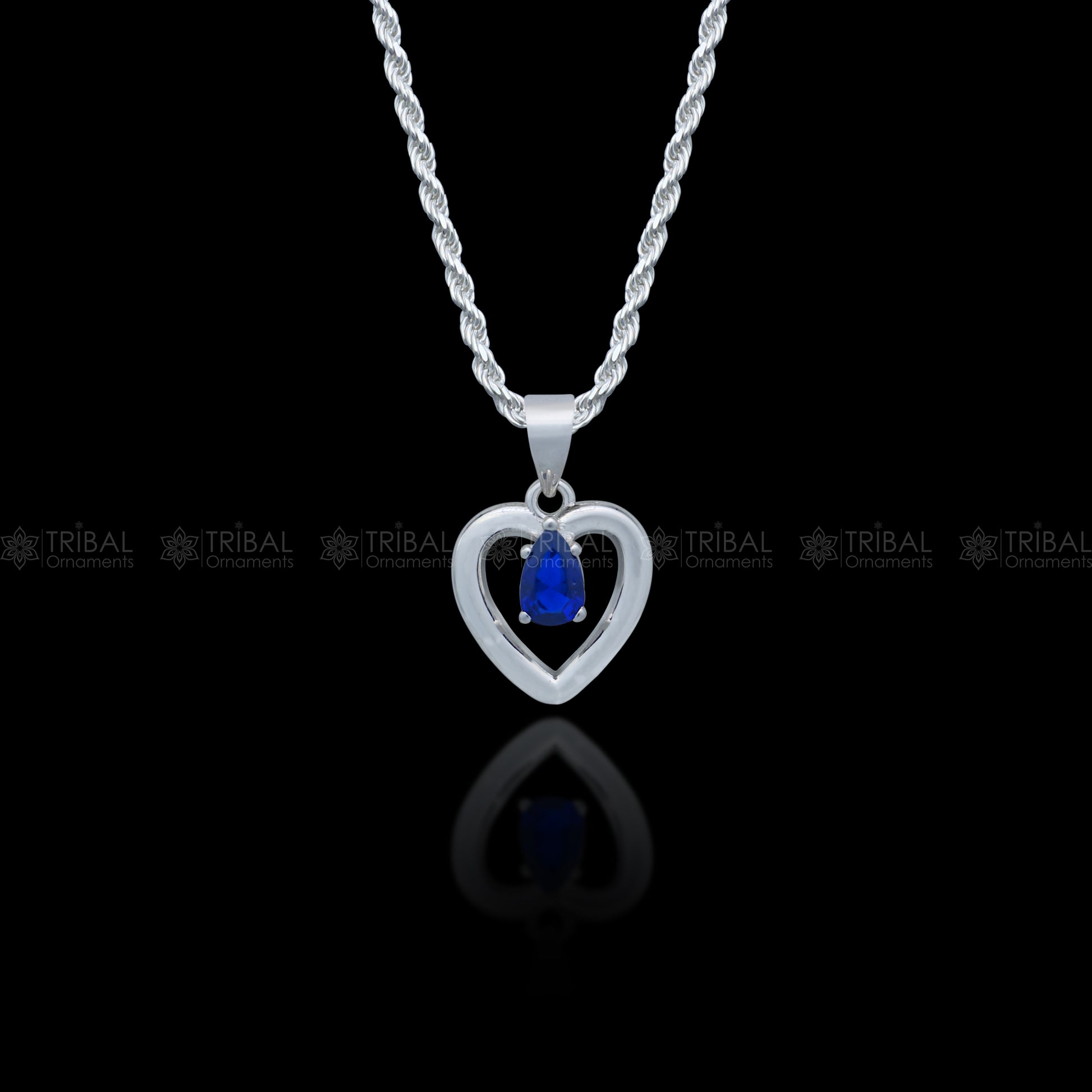 925 Sterling silver pendant set with blue sapphire diamond and heart-shaped design by Tribal Ornaments.