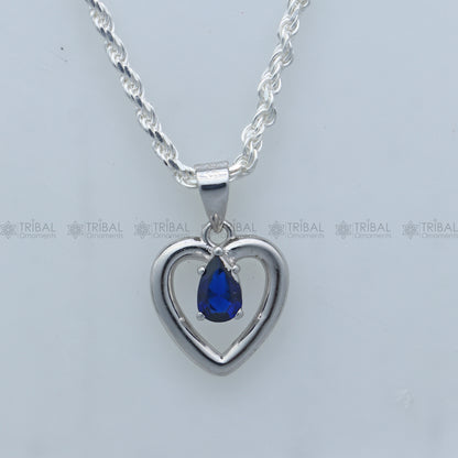 925 Sterling silver pendant set with blue sapphire heart-shaped gemstone, featuring a matching necklace and earring design.