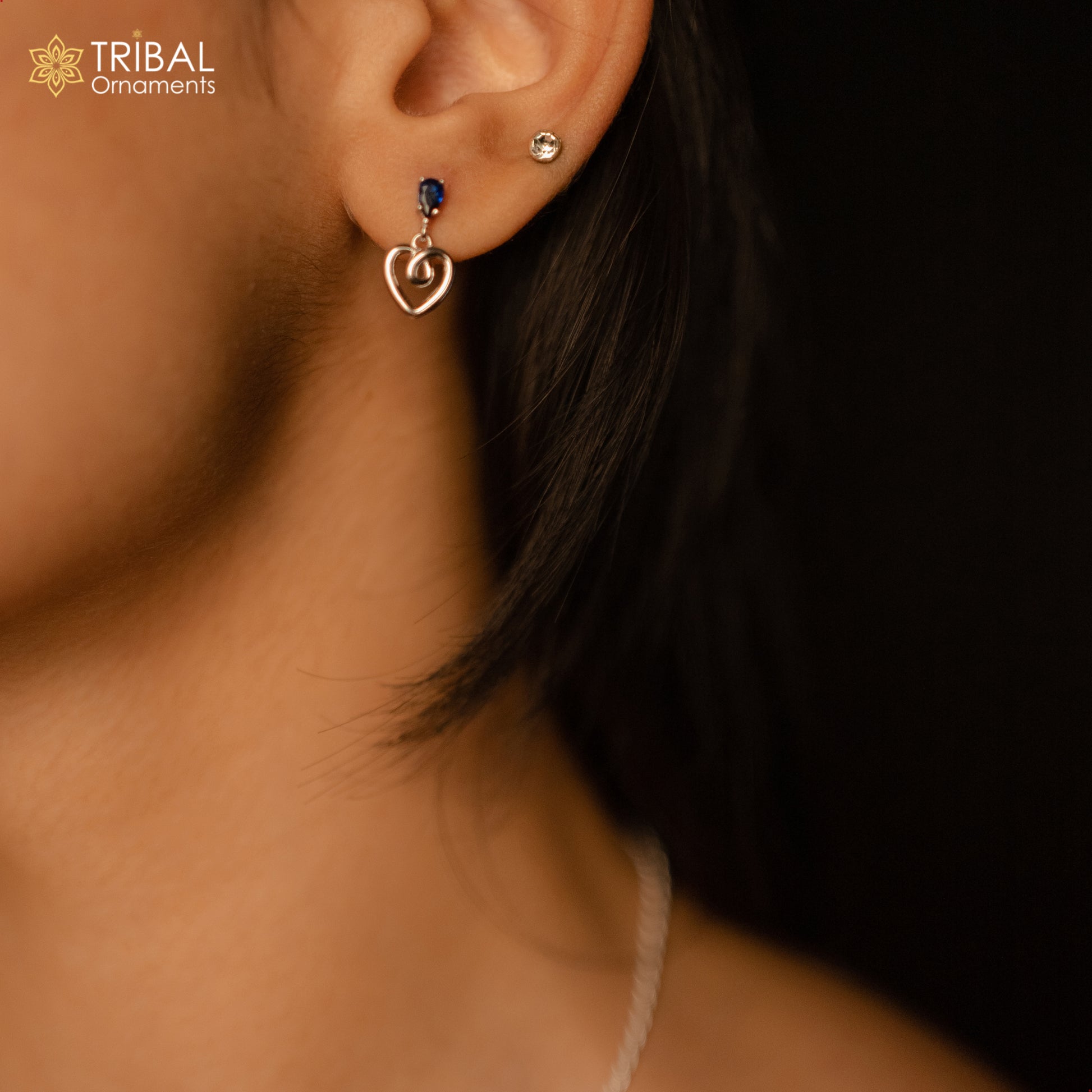 925 Sterling silver pendant set featuring a blue sapphire heart-shaped gemstone, from Tribal Ornaments.
