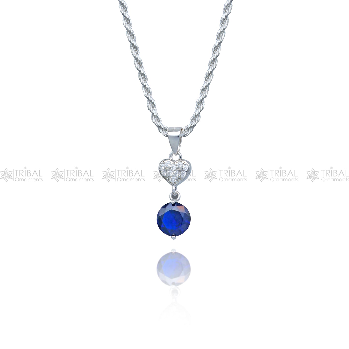 925 Sterling silver pendant set with round blue sapphire diamond from TRIBAL ORNAMENTS, featuring a elegant jewelry design.