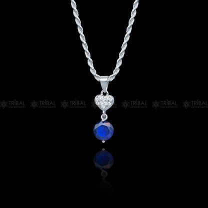 925 Sterling silver pendant set with round blue sapphire diamond, featuring a sleek, elegant design by Tribal Ornaments.