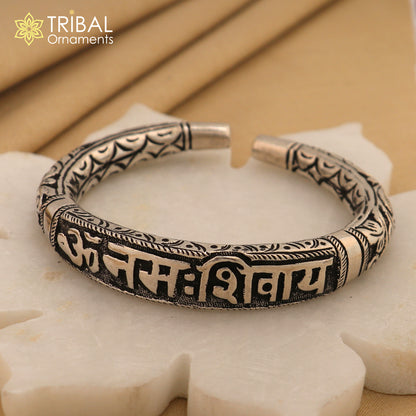 Sterling silver Chitai work bracelet featuring "Om Namah Shivay" mantra, tribal ornament jewelry, kada style.