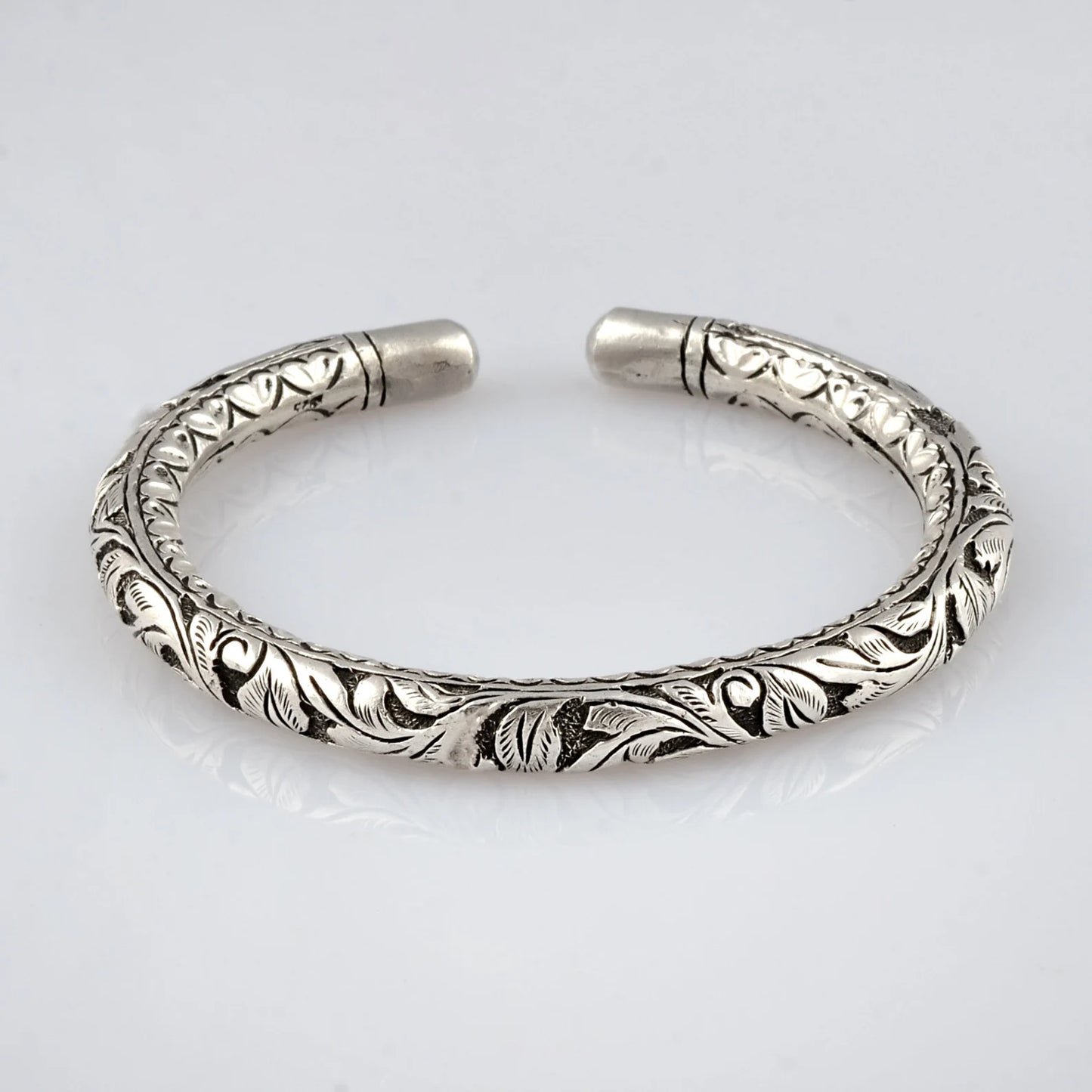 Sterling silver chitai work tribal wrist bangle cuff, ethnic tribal jewelry by TRIBAL ORNAMENTS showcasing intricate designs.