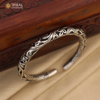 Sterling silver chitai work tribal wrist bangle cuff bracelet showcasing intricate ethnic tribal jewelry design.