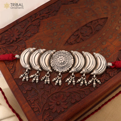 Sterling silver tribal choker necklace with flower design and ethnic charm, part of TRIBAL ORNAMENTS jewelry set.