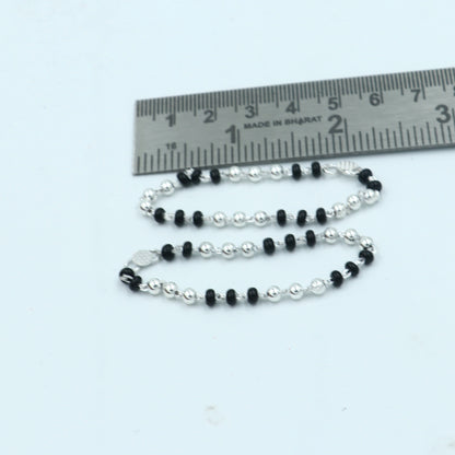 925 sterling silver Krishna necklace or baby Nazariya bracelet with black beads, designed to protect from evil eyes for infants.