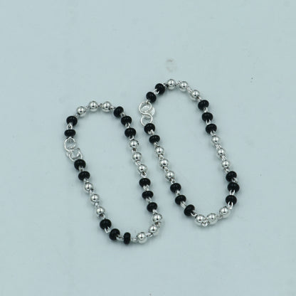 925 sterling silver Krishna necklace or baby Nazariya bracelet with black beads, designed to protect from evil eyes, by Tribal Ornaments.