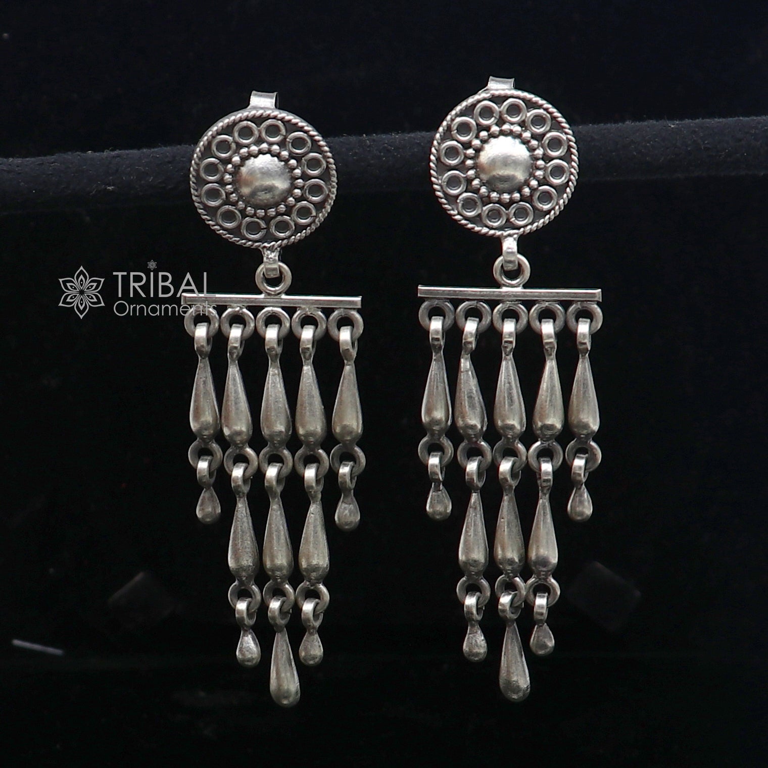 Sterling silver floral stud earring with stylish drop dangle design by TRIBAL ORNAMENTS, customized jewelry for elegant looks.