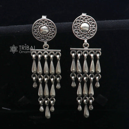 Sterling silver floral stud earring with stylish drop dangle design by TRIBAL ORNAMENTS, customized jewelry for elegant looks.