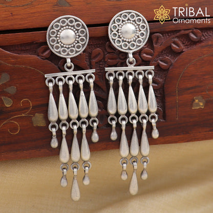Sterling silver floral stud earring with stylish drop dangle design, crafted by TRIBAL ORNAMENTS.