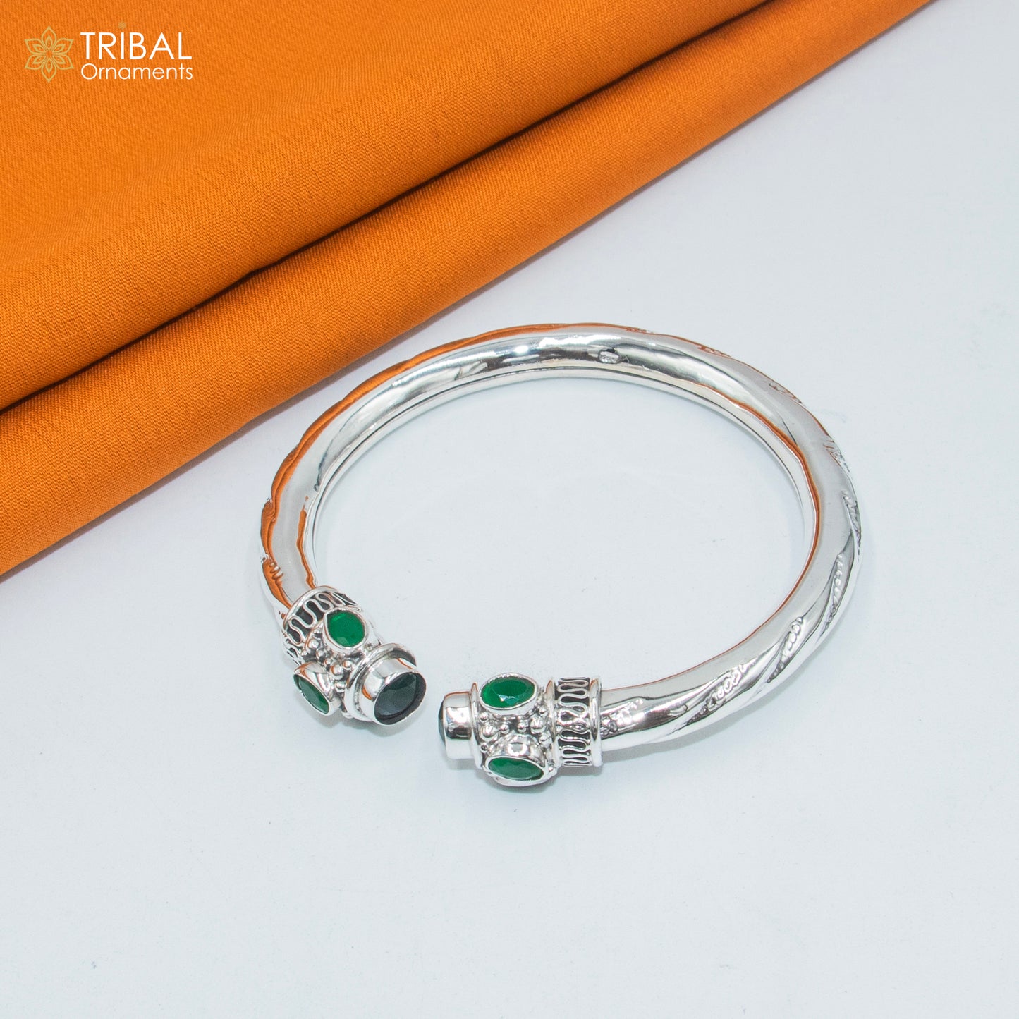 Sterling silver tribal bangle bracelet with a green turquoise stone, handcrafted tribal jewelry by TRIBAL ORNAMENTS.