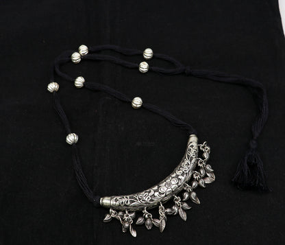 Sterling silver customized trendy chitai charm necklace with tribal kandrai work, paired with delicate matching jewelry set.