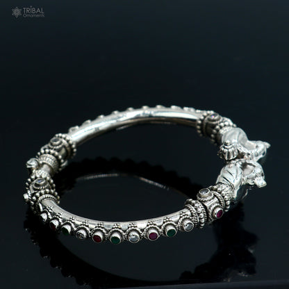 925 Sterling silver peacock bangle from TRIBAL ORNAMENTS featuring tribal-inspired jewelry design and intricate detailing.