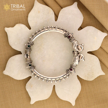 925 Sterling silver customized peacock bangle from Tribal Ornaments, featuring tribal design and intricate peacock detailing.