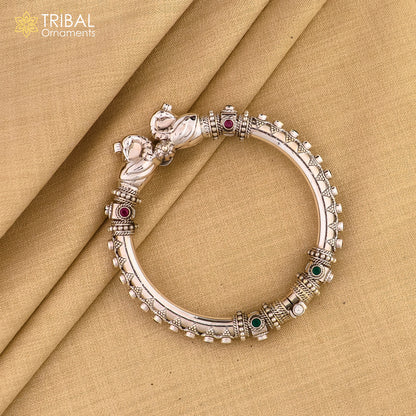 925 Sterling silver customized peacock bangle by Tribal Ornaments featuring tribal-inspired design and intricate detailing.