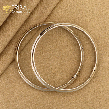 Sterling silver customized stylish bangle bracelet with a shiny, flexible design, tribal jewelry by TRIBAL ORNAMENTS.