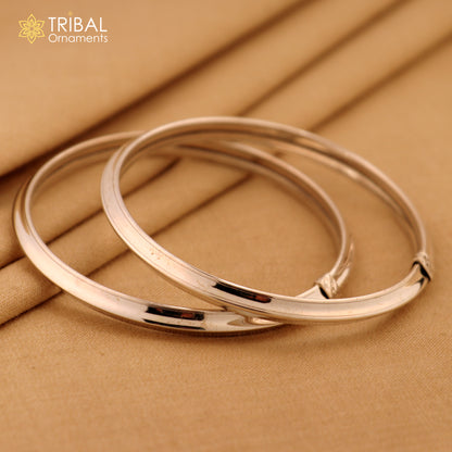 Sterling silver customizable shiny bangle bracelet by TRIBAL ORNAMENTS, stylish flexible tribal jewelry kada.