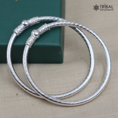 925 Sterling silver tribal-style ball design bangle Kada by TRIBAL ORNAMENTS, featuring custom craftsmanship and intricate detailing.