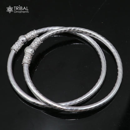 Sterling silver customized stylish ball design bangle kada by TRIBAL ORNAMENTS, tribal jewelry with intricate craftsmanship.