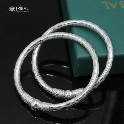 Sterling silver tribal bangle with stylish ball design, customized jewelry by TRIBAL ORNAMENTS featuring traditional tribal motifs.