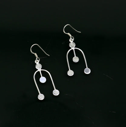 Sterling silver drop dangle hoop earring with unique tribal-inspired design and 925 stamp, fashionable jewelry for gifting or parties.