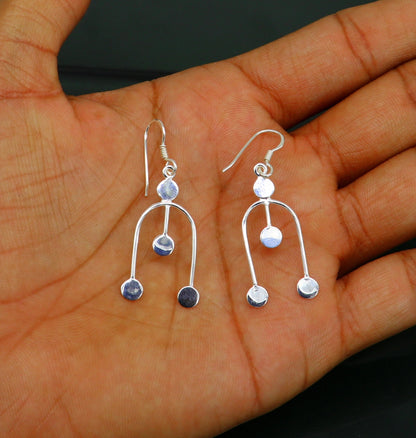 Sterling silver drop dangle hoop earring with unique design from TRIBAL ORNAMENTS, stamped 925, perfect for gifting or fashionable wear.