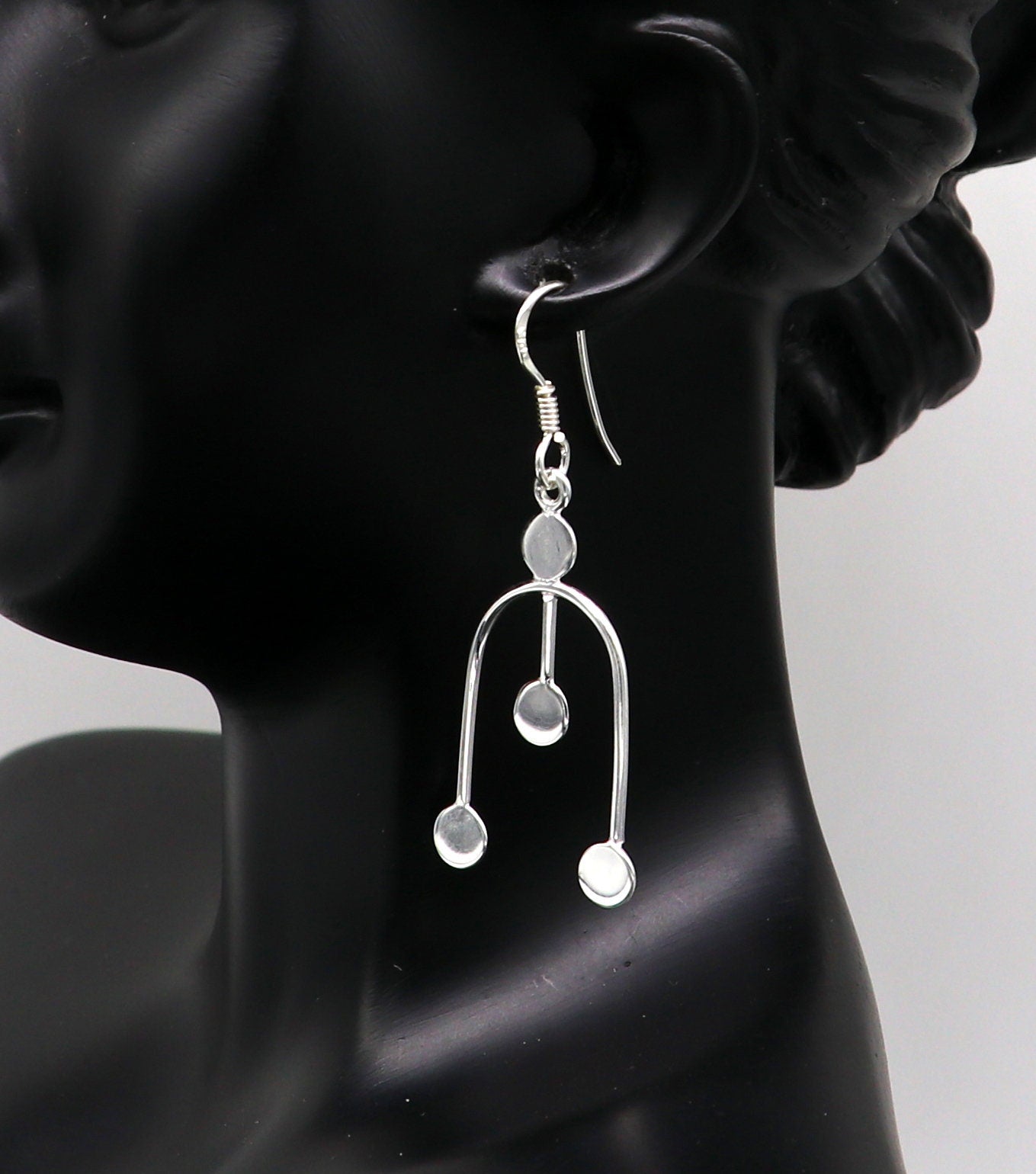 Sterling silver drop dangle hoop earring with unique custom design and stamped 925, stylish jewelry for gifting or parties.