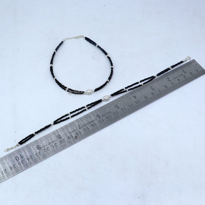 Sterling silver double chain anklet with black beads, lightweight and delicate jewelry by TRIBAL ORNAMENTS.