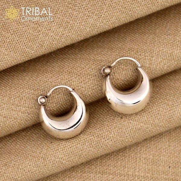 Sterling silver traditional Indian-style hoops earring by TRIBAL ORNAMENTS, lightweight, unisex, customized jewelry with intricate design.