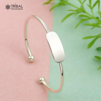 Sterling silver baby bangle bracelet with bright, plain design from Tribal Ornaments, ideal for newborns and as a gift.