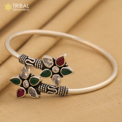 Sterling silver cuff bracelet with red and green cut stones, tribal design, fabulous bangle by TRIBAL ORNAMENTS.