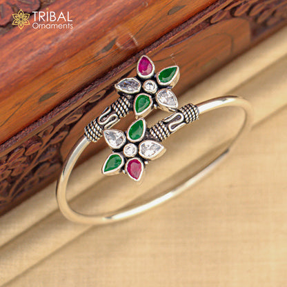 925 sterling silver cuff bangle bracelet with red and green cut stones, tribal ornament design, stylish and elegant jewelry piece