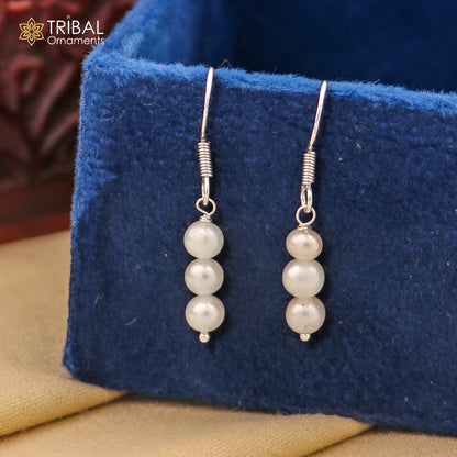 Sterling silver hoop earrings with pearls and stone accents, stylish and lightweight jewelry by Tribal Ornaments