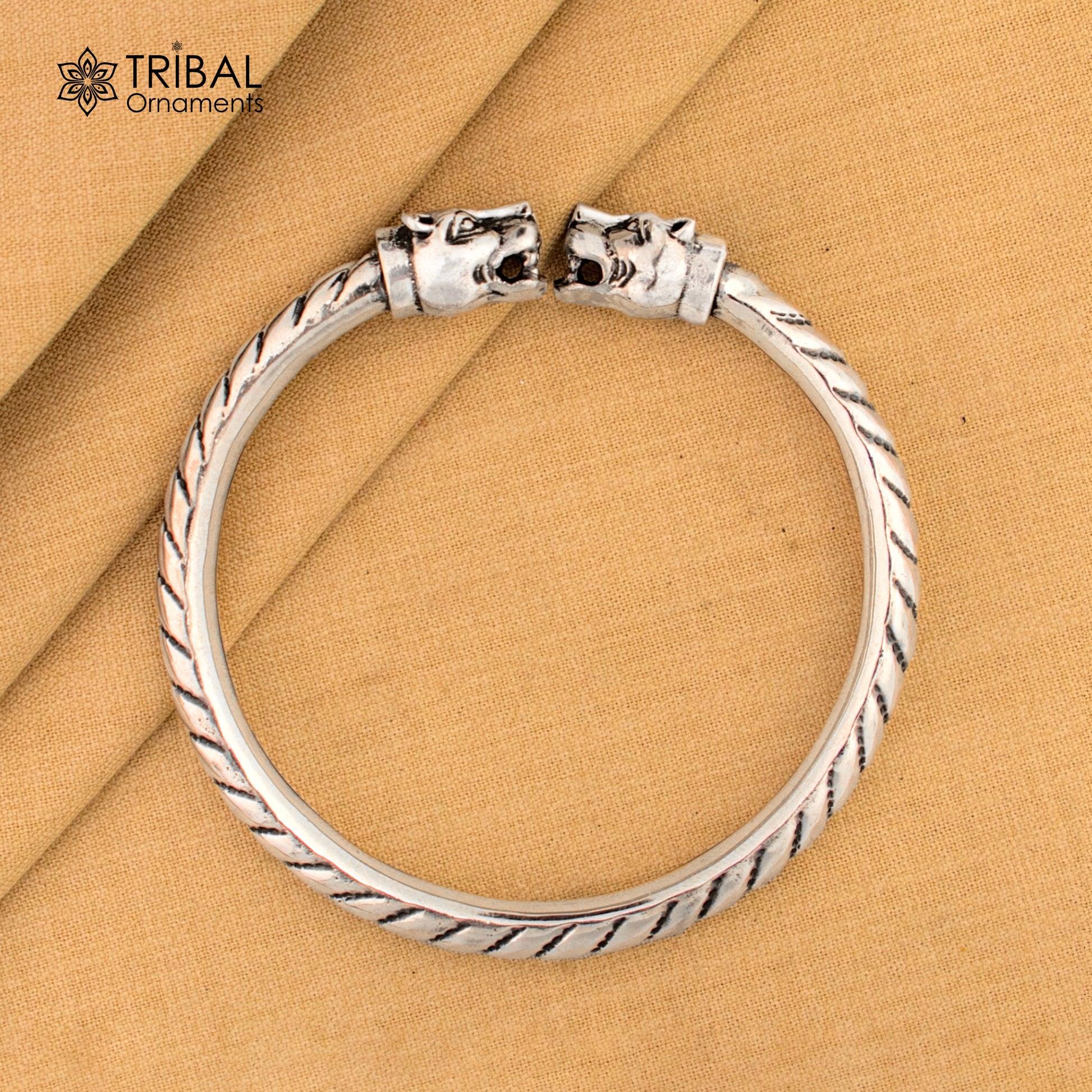 Sterling silver lion face kada bracelet with tribal design, stylish belly dance jewelry, crafted by TRIBAL ORNAMENTS.