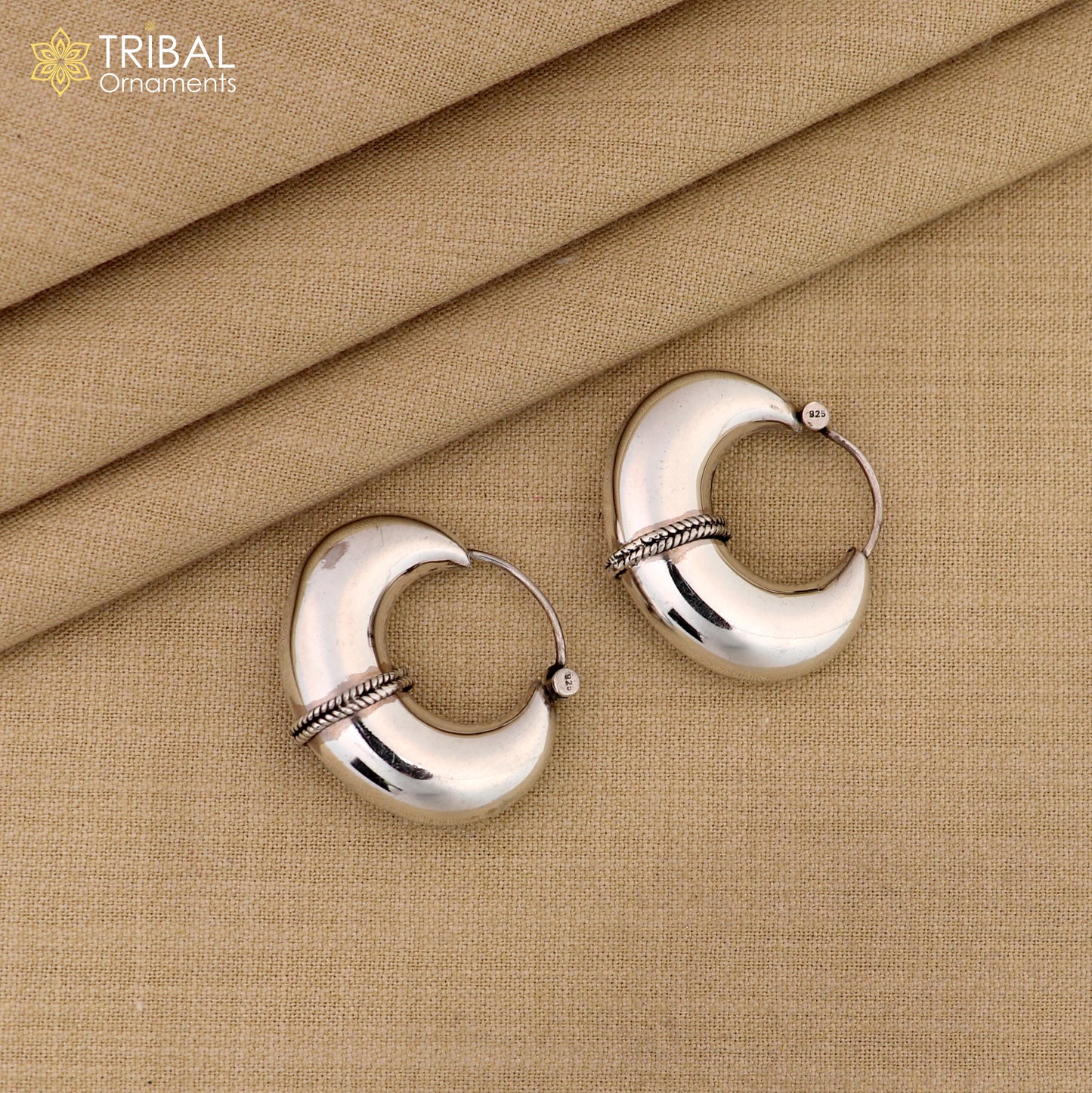 Sterling silver vintage hoop earrings with a plain, elegant design from TRIBAL ORNAMENTS, showcasing cultural jewelry style.