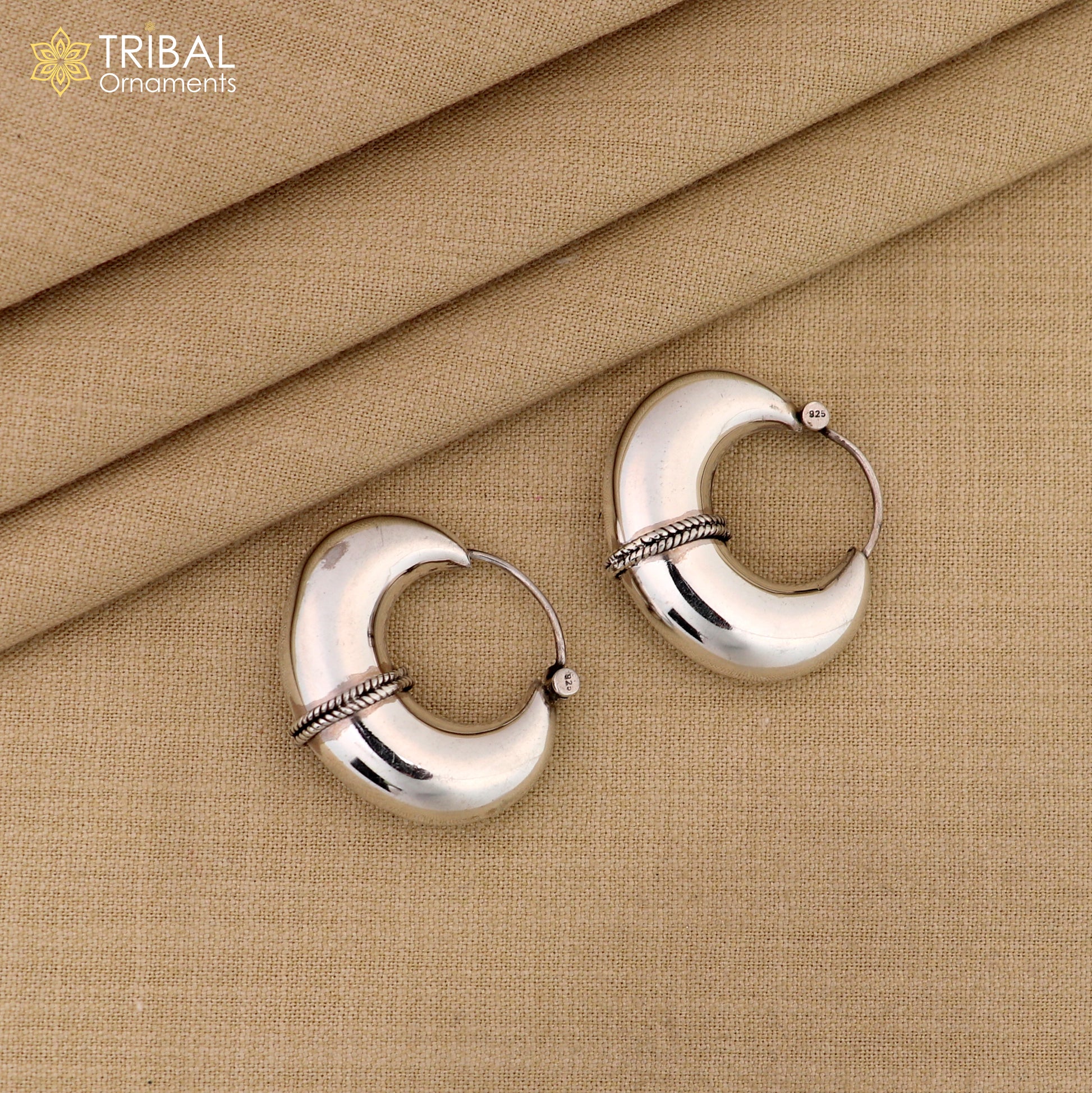 Sterling silver vintage hoop earrings with a plain, elegant design from TRIBAL ORNAMENTS, showcasing cultural jewelry style.