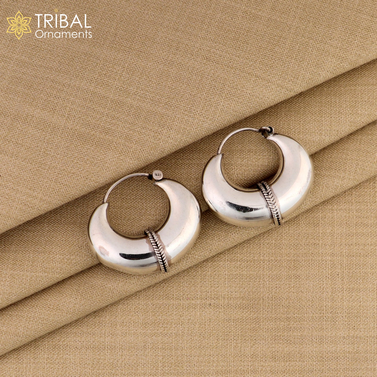 Elegant 925 sterling silver vintage hoop earrings with a plain design, from TRIBAL ORNAMENTS, showcasing cultural jewelry style.