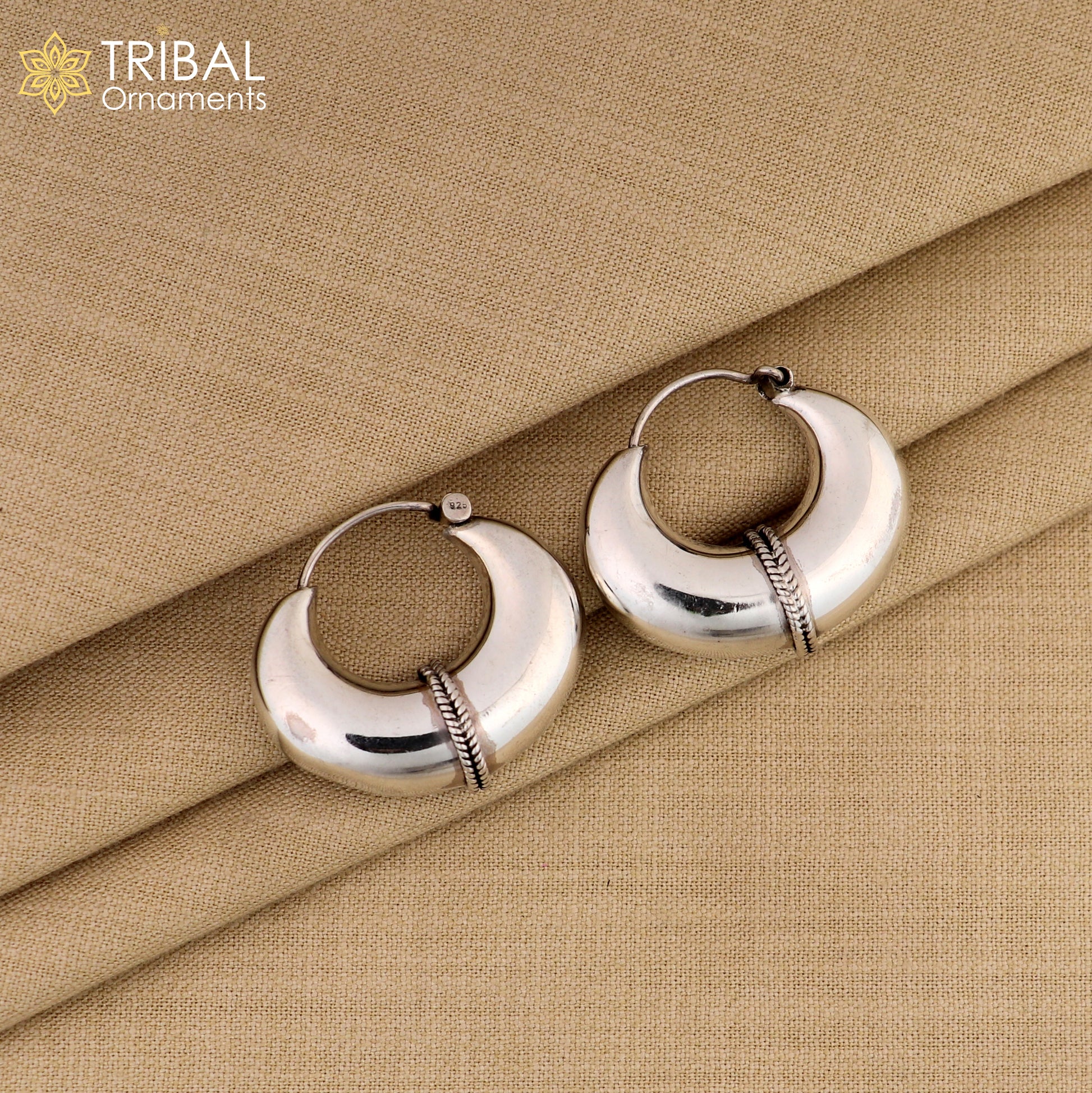 Elegant 925 sterling silver vintage hoop earrings with a plain design, from TRIBAL ORNAMENTS, showcasing cultural jewelry style.