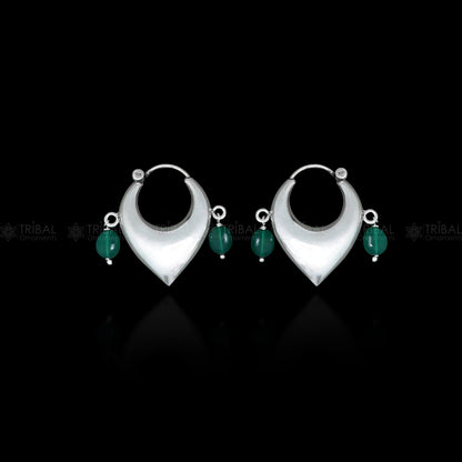 Sterling silver vintage hoop earrings with green beads, elegant cultural jewelry by TRIBAL ORNAMENTS, featuring a classic design.