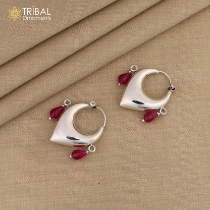 Sterling silver vintage hoop earrings with pink beads, elegant tribal-inspired design, perfect for cultural and stylish occasions.