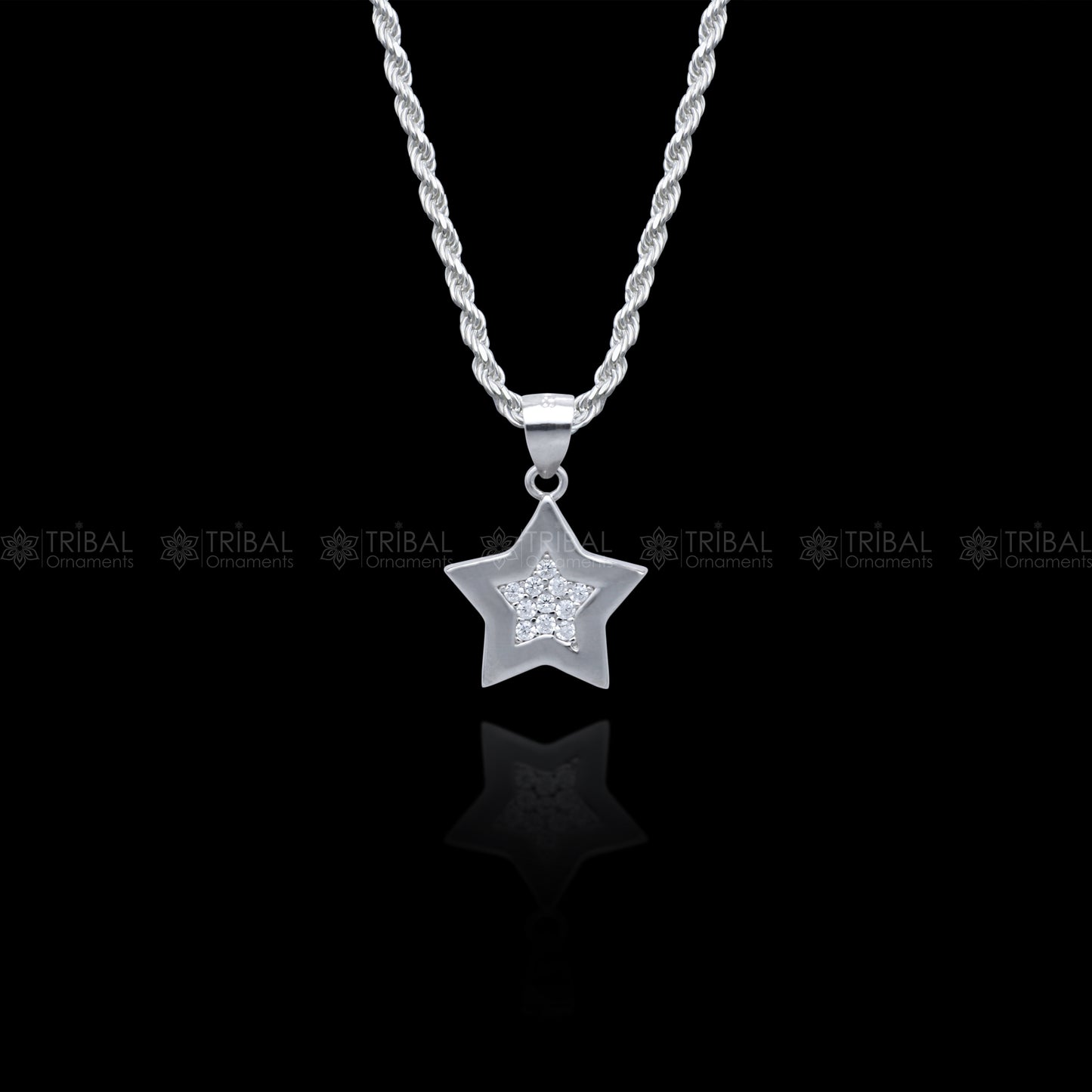 Sterling silver star pendant set with diamond cubic zirconia stones, stylish jewelry by TRIBAL ORNAMENTS.