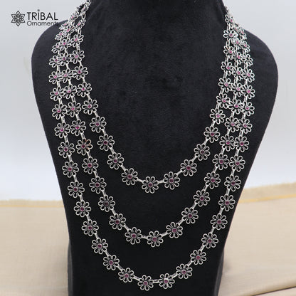 Sterling silver floral-style red stone 3-line necklace set by TRIBAL ORNAMENTS, featuring ethnic jewelry design with intricate details.