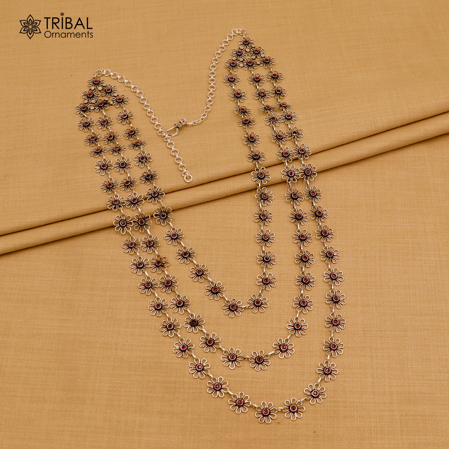 Sterling silver floral style red stone 3-line necklace set by TRIBAL ORNAMENTS, featuring ethnic jewelry with intricate design.