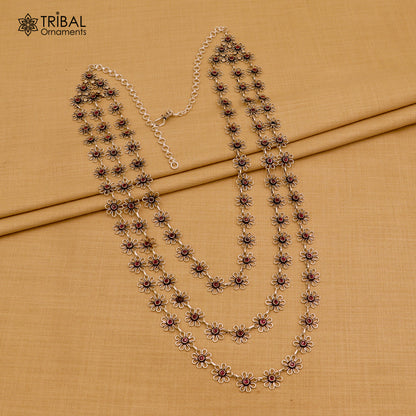 Sterling silver floral style red stone 3-line necklace set by TRIBAL ORNAMENTS, featuring ethnic jewelry with intricate design.