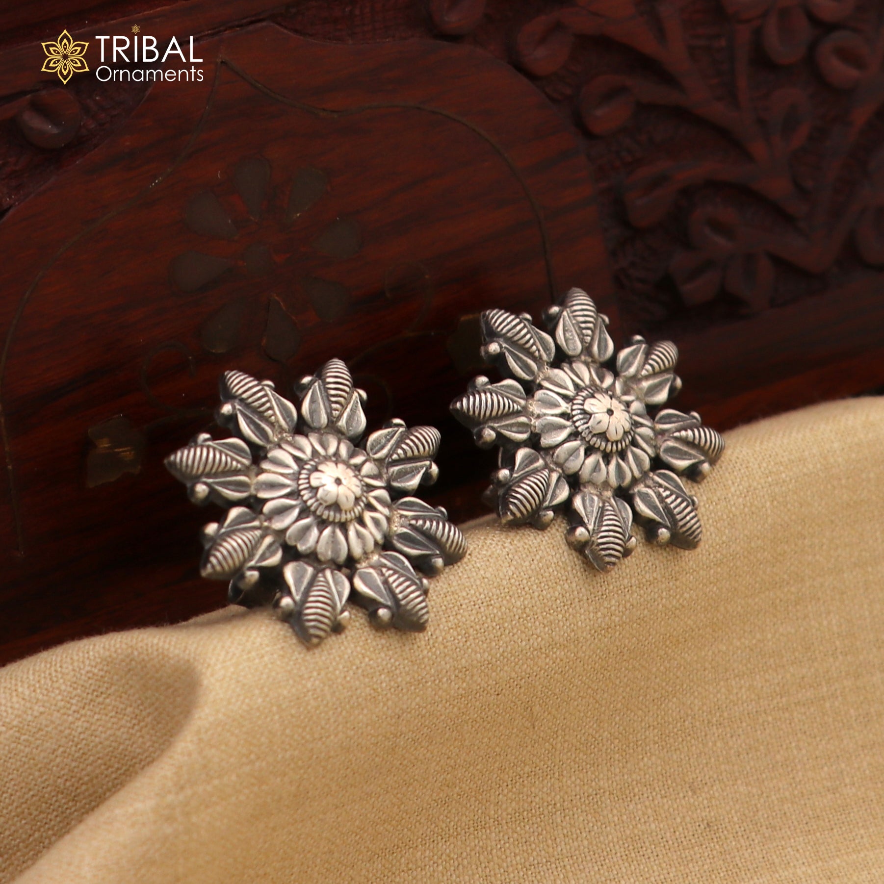 Sterling silver flower design stud earring from TRIBAL ORNAMENTS, stylish and elegant jewelry for everyday wear.