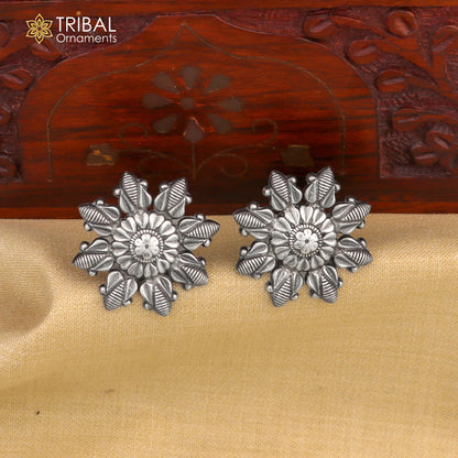 Sterling silver flower design stud earring from TRIBAL ORNAMENTS, stylish and detailed jewelry accessory.