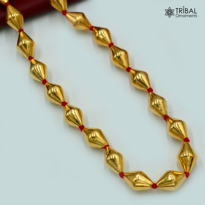 Sterling silver and gold polished Dholki beaded necklace from TRIBAL ORNAMENTS tribal jewelry set, featuring intricate beaded design.