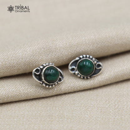 Sterling silver green onyx stud earring, unisex jewelry by Tribal Ornaments, showcasing a polished green onyx stone in a silver setting.