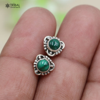 925 sterling silver stud earring with a vibrant green onyx stone, unisex jewelry by Tribal Ornaments, close-up view of the earring.